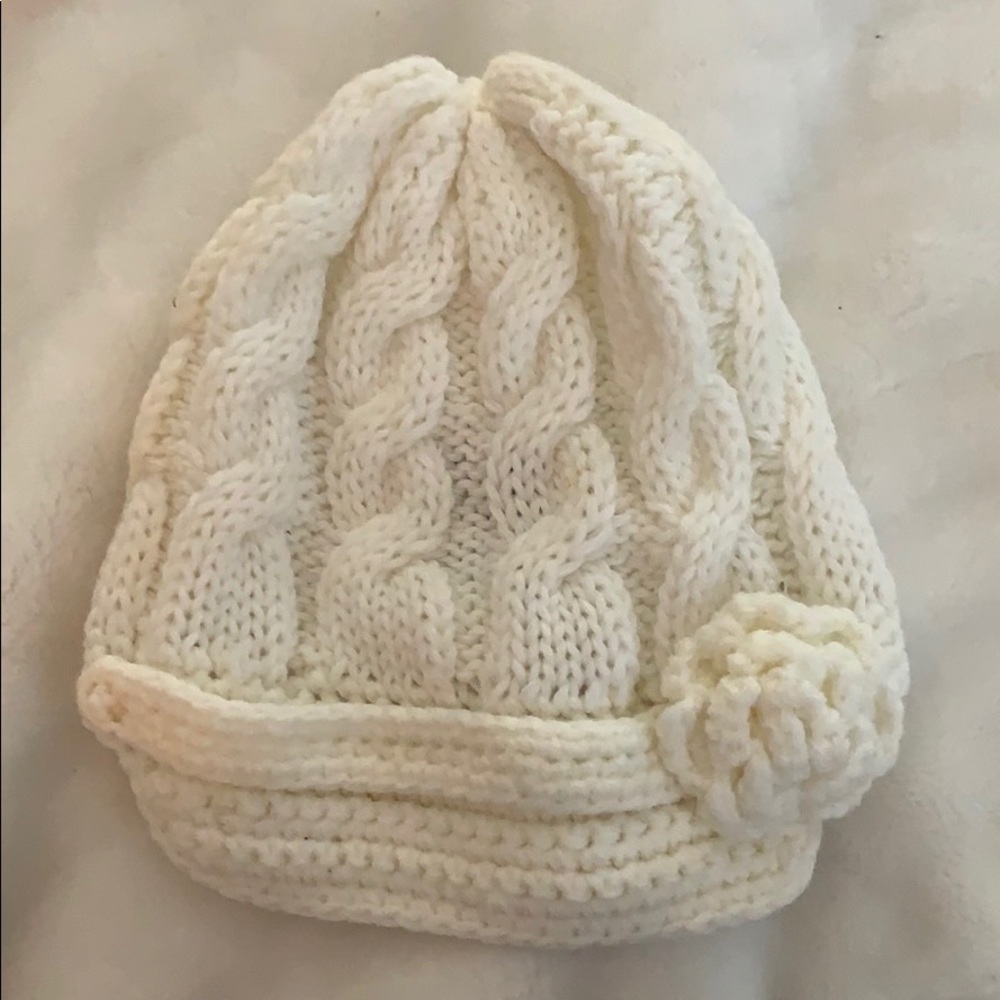 Soft knit winter hat with brim and flower detail